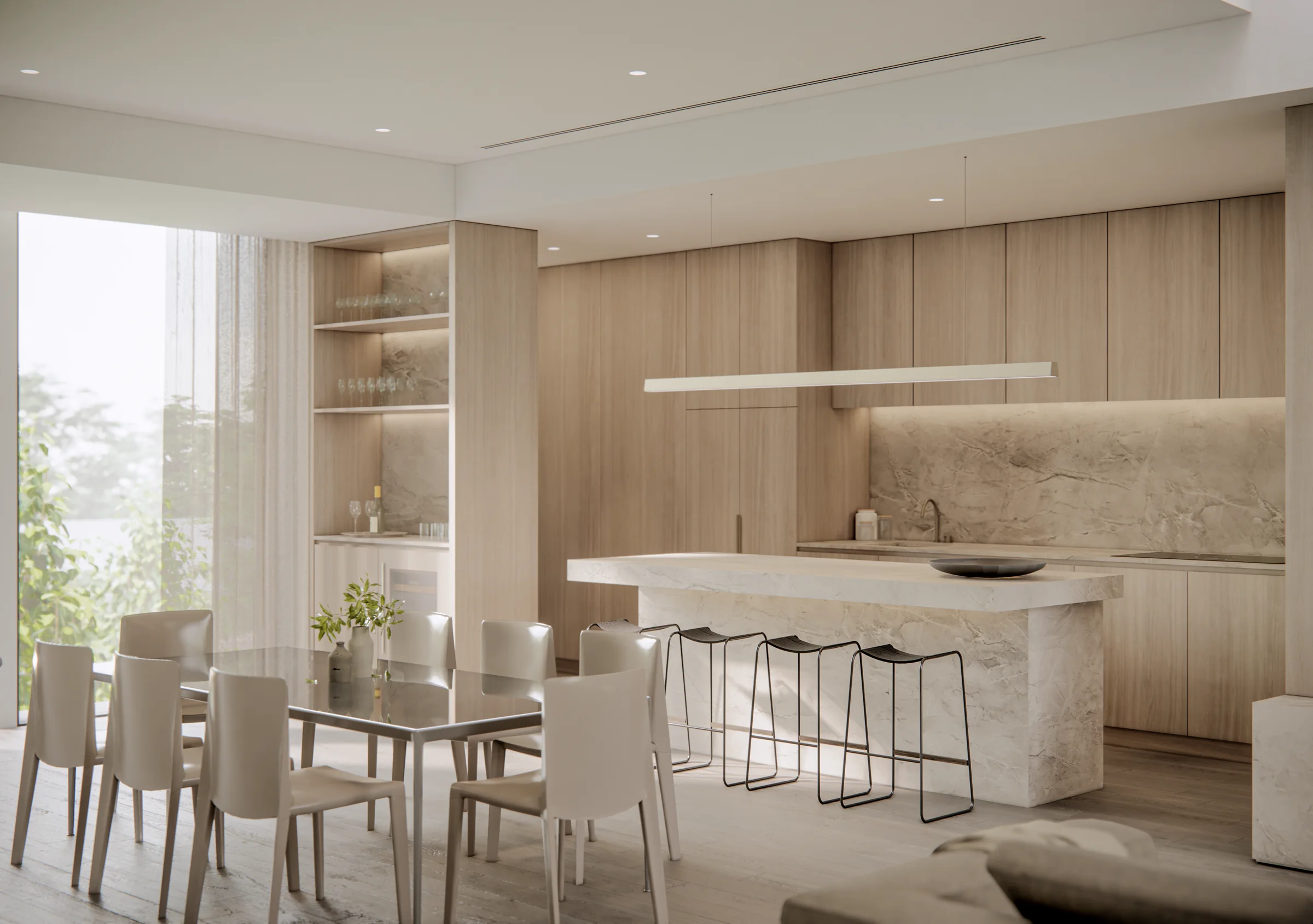 Filaro kitchen, dining and living space with stone island and fitted bar